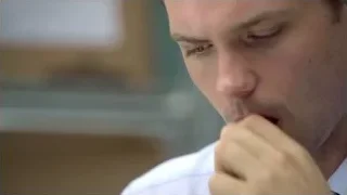 Young man with eyes closed deep in thought — Suits