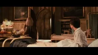 elderly man giving presents to boy — Harry Potter and the Philosophers Stone