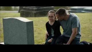 man and girl embracing in cemetery — Southpaw
