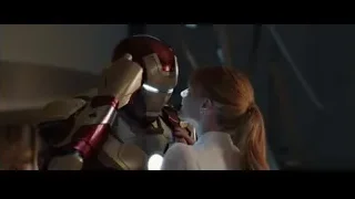 Iron Man and woman in romantic embrace — Iron Man 3