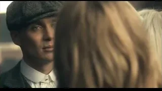 Man in cap and suit with serious expression — Peaky Blinders
