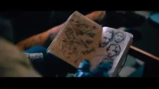 hand holding open book — John Wick: Chapter 4