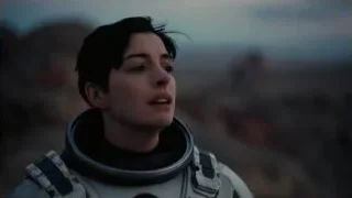 Woman in space suit in desert landscape — Interstellar