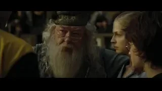 Elderly man conversing with two young women — Harry Potter and the Goblet of Fire