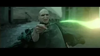 Bald man with glowing green light saber — Harry Potter and the Deathly Hallows 2