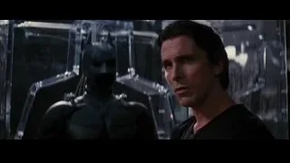 Christian Bale in futuristic setting with glass cube — Batman: The Dark Knight Rises