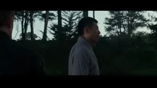 two men facing each other in wooded area — Bruce Lee: Birth of The Dragon
