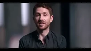 Man with beard looking off to side — The Social Dilemma