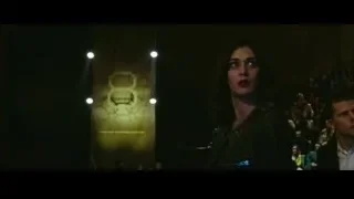 man and woman on stage before crowd — Now You See Me 2