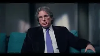 elderly man in armchair in dimly lit room — The Social Dilemma