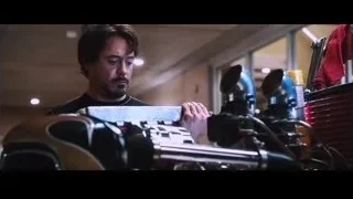 man working on motorcycle engine — Iron Man