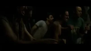 Two shirtless men fighting in dimly lit room — Fight Club