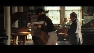 man and woman embracing in piano room — The Secret Life of Walter Mitty