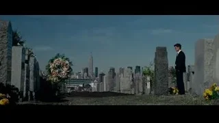 man in suit in cemetery with NYC skyline — The Amazing Spider Man 2