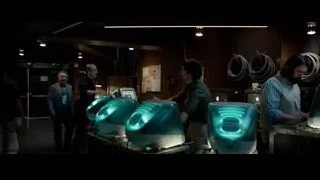 men working with futuristic objects in workshop — Steve Jobs