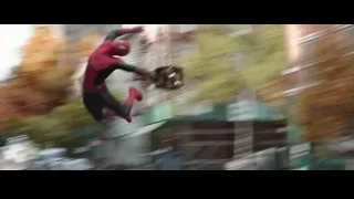 two characters fighting on cobblestone street — Spiderman: No Way Home