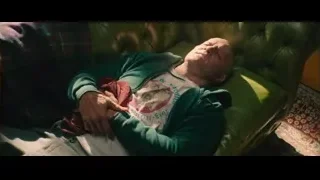 Elderly man sleeping on green leather couch — Deadpool 2