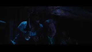 Man with lantern and woman in dark cave — Harry Potter and the Philosophers Stone