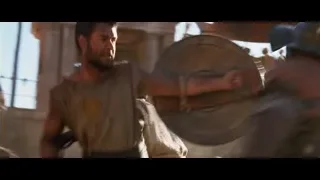 Man with sword fighting in front of crowd — Gladiator