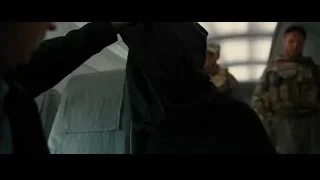 Man wearing gas mask in airplane — Batman: The Dark Knight Rises