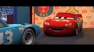 two Cars movie characters parked — Cars