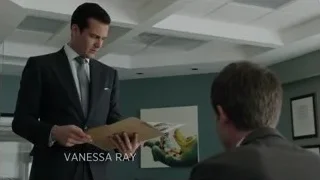 Man in suit holding folder seriously — Suits