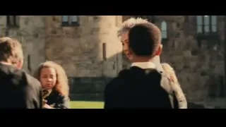 Group of children by stone building — Harry Potter and the Philosophers Stone