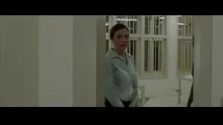 Woman standing in hallway with window — Creed