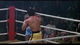 two boxers fighting in a ring — Rocky III