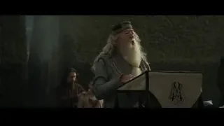 Elderly man giving speech in eerie environment — Harry Potter and the Goblet of Fire