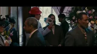 Group of men in formal attire conversing — The Dictator