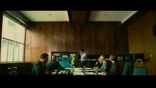 man pointing at blackboard conference room — Limitless