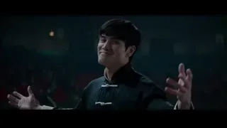 man in traditional Chinese outfit in dim room — Bruce Lee: Birth of The Dragon