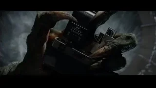 Close-up of hands holding small black object — The Amazing Spider Man