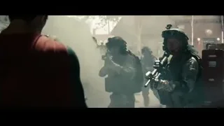 Soldiers in combat gear on smoky street — Superman: Man of Steel