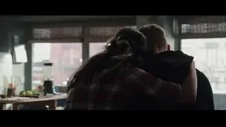 man and woman embracing in kitchen — Deadpool