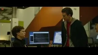two young men discussing code in computer lab — The Social Network
