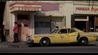 Clock hanging on wet city street at night — Rocky III