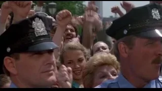 Police with elderly man in crowd — Rocky III