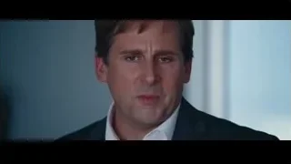 Man in suit looking at computer monitor — The Big Short