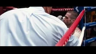 injured boxer lying in a ring — Southpaw
