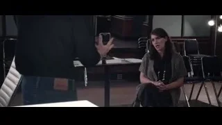 woman in lecture hall with empty chairs — Steve Jobs