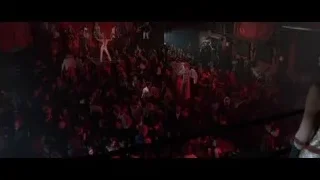 man dancing on nightclub stage — American Psycho