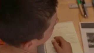 young boy and girl at desk in classroom — Screened Out