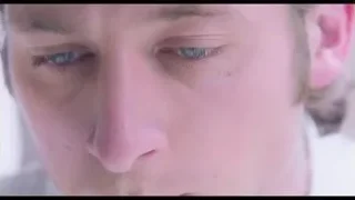 Young man's face with closed eyes — The Bear