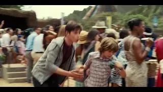 people at animal exhibit — Jurassic World