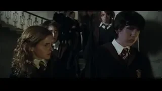 Students in school uniforms on staircase — Harry Potter and the Goblet of Fire