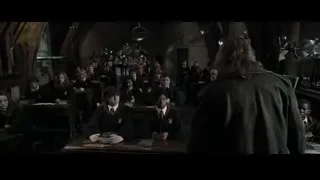 students in dimly lit classroom with teacher — Harry Potter and the Goblet of Fire
