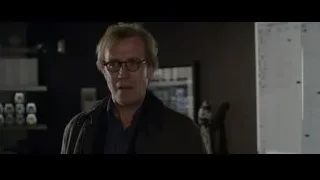 Man with blonde hair and glasses in dimly lit room — The Amazing Spider Man