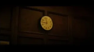round clock on dark wooden wall — Whiplash